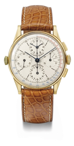 Universal. An unusual and large 18K gold pilot's dual time zone chronograph wristwatch with subsidiary aide m