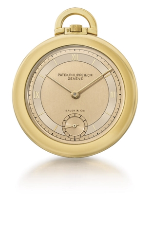 Patek Philippe. A slim and attractive 18K gold openface keyless lever dress watch with two-tone champagne dial