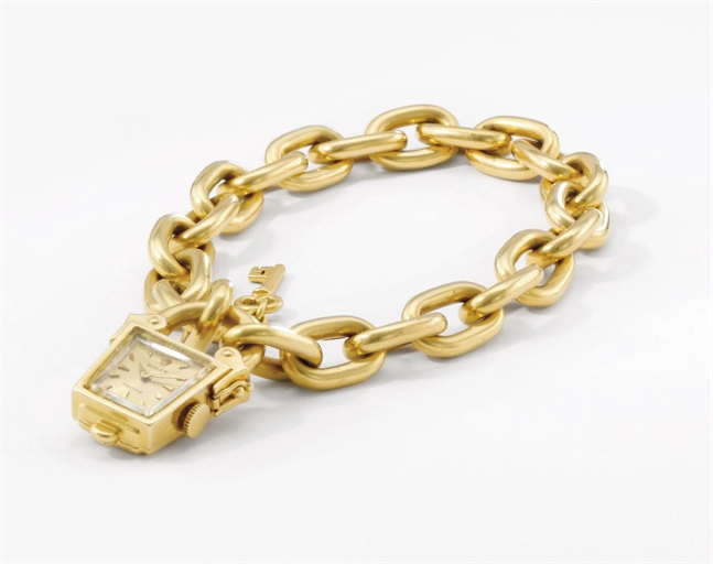 Rolex. An unusual 18K gold padlock-form bracelet watch