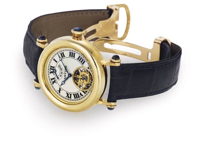 CARTIER. A FINE 18K GOLD AUTOMATIC TOURBILLON WRISTWATCH WITH POWER RESERVE