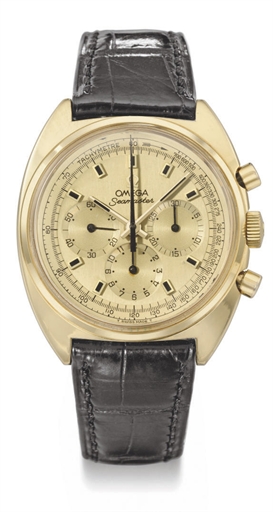 Omega. An 18K gold tonneau-shaped chronograph wristwatch