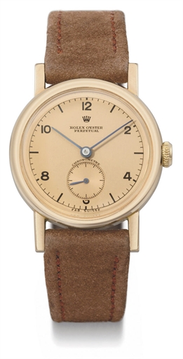 Rolex. A fine and unusual 18K pink gold automatic wristwatch with pink dial