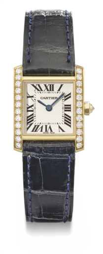 Cartier. A lady's fine 18K gold and diamond-set rectangular curved wristwatch