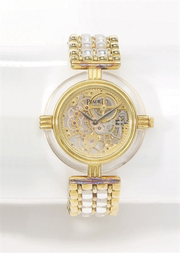Piaget. A lady's fine and unusual 18K gold and rock crystal skeletonized wristwatch with bracelet