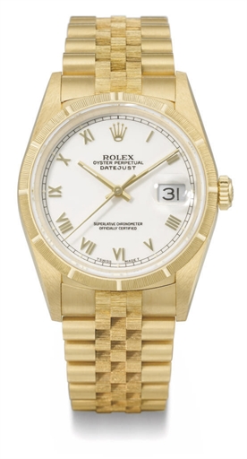 Rolex. An 18K gold automatic wristwatch with sweep centre seconds, date and bracelet