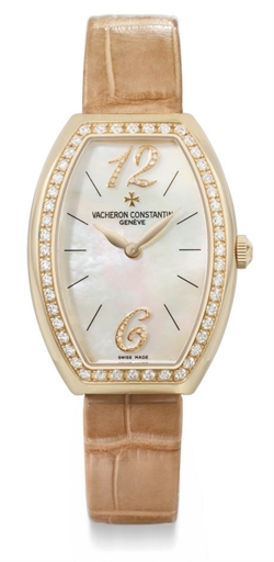 Vacheron Constantin. A lady's fine 18K pink gold and diamond-set tonneau-shaped curved wristwatch with mother-of-pearl dial