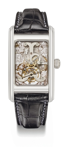 Audemars Piguet. A fine, rare and unusual platinum and rutilated quartz rectangular skeletonized tourbillon wristwatch with box