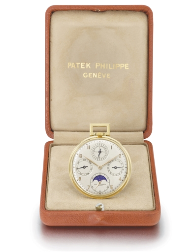 Patek Philippe. A fine 18K gold openface perpetual calendar keyless lever watch with moon phases