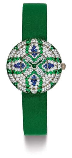 BLANCPAIN. A LADY'S UNIQUE 18K WHITE GOLD, DIAMOND, EMERALD AND SAPPHIRE WRISTWATCH