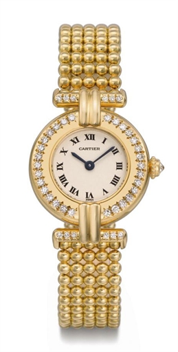 Cartier. A lady's fine 18K gold and diamond-set wristwatch with bracelet
