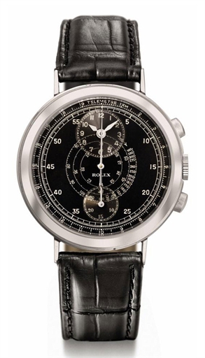 Rolex. A very fine and rare stainless steel chronograph wristwatch with black regulator dial and box