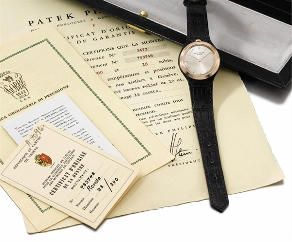 Patek Philippe. A fine, rare and unusual 18K pink gold wristwatch with crown to 12 o'clock, original certificates and box