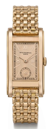 Patek Philippe. A very rare and attractive 18K pink gold wristwatch with rose dial and bracelet