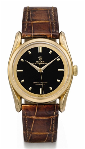 Rolex. A fine and rare 18K gold automatic wristwatch with sweep centre seconds, fancy lugs and black lacquer dial