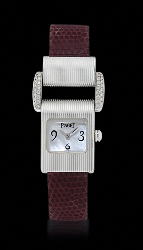 PIAGET, MISS PROTOCOLE.LADY'S WHITE GOLD AND DIAMOND-SET QUARTZ WRISTWATCH WITH MOTHER OF PEARL DIAL