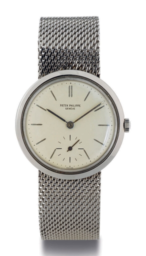 PATEK PHILIPPE. A STAINLESS STEEL WRISTWATCH WITH BRACELET