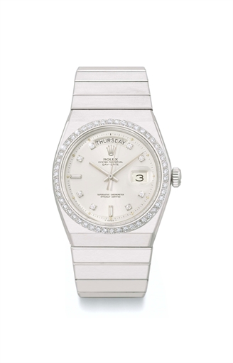 Rolex. An extremely rare platinum and diamond-set automatic calendar wristwatch with sweep centre seconds and bracelet