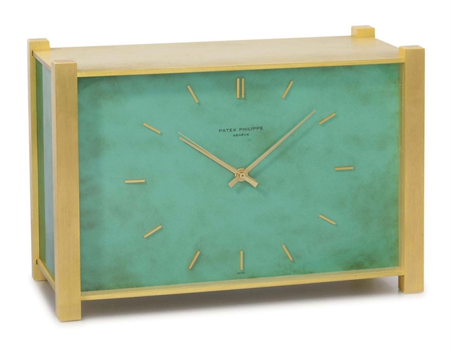 Patek Philippe. A very rare, unusual and attractive gilt brass and green lacquered electronic quartz desk clock with sweep centre seconds