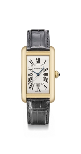 Cartier. A large 18K gold rectangular curved automatic wristwatch with sweep centre seconds and date