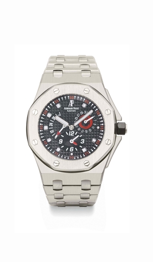 Audemars Piguet. A large titanium limited edition automatic dual time wristwatch with date, power reserve and bracelet