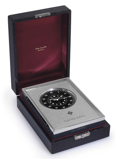 PATEK PHILIPPE. AN ALUMINIUM MARINE CHRONOMETER WITH JUMPING CENTER SECONDS AND ORIGINAL FITTED BOX