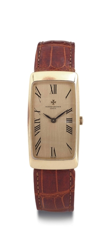 VACHERON CONSTANTIN. AN 18K GOLD CURVED ASYMMETRICAL WRISTWATCH