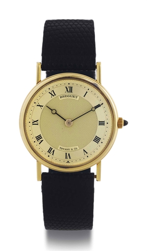 BREGUET. AN 18K GOLD WRISTWATCH