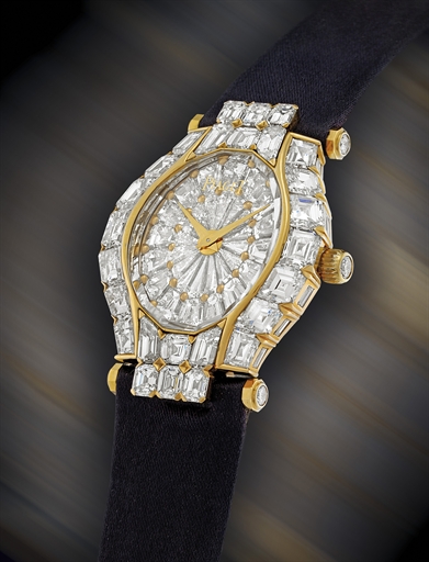 PIAGET. AN IMPRESSIVE AND EXTREMELY RARE 18K GOLD AND DIAMOND-SET TONNEAU-SHAPED WRISTWATCH