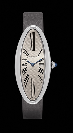 CARTIER. A LADY'S FINE 18K WHITE GOLD ELONGATED OVAL WRISTWATCH