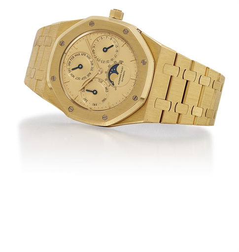 AUDEMARS PIGUET. AN 18K GOLD AUTOMATIC PERPETUAL CALENDAR WRISTWATCH WITH MOON PHASES AND BRACELET