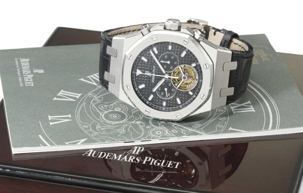 Audemars Piguet. A rare and large stainless steel tonneau-shaped chronograph wristwatch with one minute tourbillon