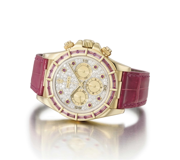Rolex. An unusual and attractive 18K gold, diamond and pink sapphire-set chronograph wristwatch