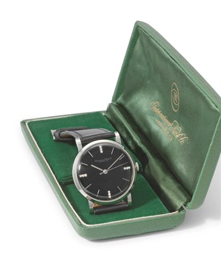 IWC. An attractive 18K white gold wristwatch with sweep centre seconds, black gloss dial, diamond-set quarters and original box