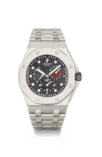 Audemars Piguet. A large titanium limited edition tonneau-shaped automatic dual time wristwatch with power reserve and bracelet