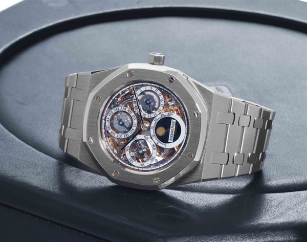 Audemars Piguet. A Fine Stainless Steel Skeletonized Automatic Perpetual Calendar Wristwatch With Bracelet And Moon Phases