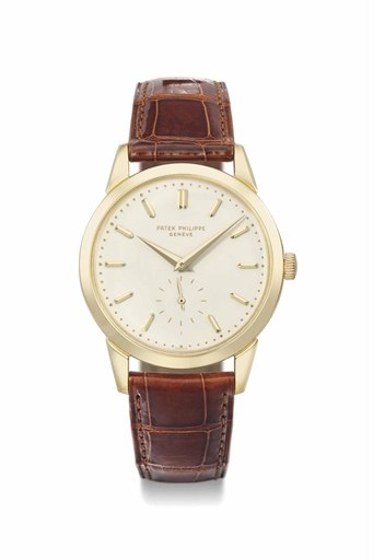 Patek Philippe. A fine and rare 18K gold wristwatch with enamel dial