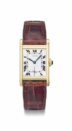 Cartier. A lady's 18K gold rectangular wristwatch with white dial