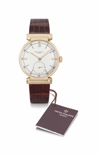 Patek Philippe. A rare and unusual 18K pink gold wristwatch with flexible hooded lugs