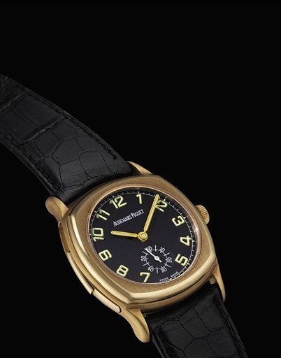 AUDEMARS PIGUET. A FINE AND RARE 18K GOLD LIMITED EDITION CUSHION-SHAPED MINUTE REPEATING WRISTWATCH WITH BLACK DIAL, LUMINOUS NUMERALS AND HANDS