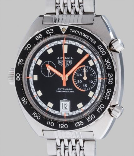 Heuer Follow;Ref. 1563, stamped 1163V between lugs;A very rare and highly attractive large stainless steel chronograph wristwatch with orange hands and bracelet