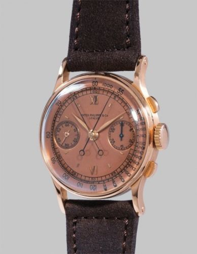 Patek Philippe Follow;Ref. 1436;An extremely fine and rare pink gold split seconds chronograph wristwatch with pink dial, original certificate, envelope, invoice and presentation box
