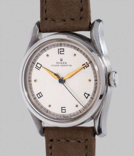 Rolex Follow;Ref. 5018;A very rare and highly attractive stainless steel wristwatch with two-tone dial and center seconds