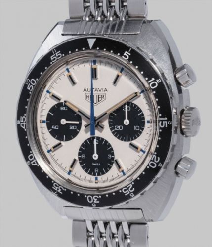 Heuer Follow;Ref. 73663;A very attractive and rare stainless steel chronograph wristwatch with silver dial, black registers, blue accents and bracelet
