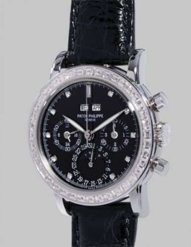 Patek Philippe Follow;Ref. 3990;A highly rare and extremely attractive platinum and diamond-set perpetual calendar chronograph wristwatch with moon phases, additional case back, setting pin, fitted presentation box and original certificate