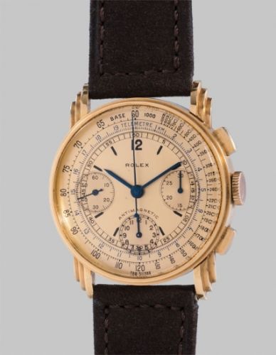 Rolex Follow;Ref. 3835;A very rare and fine yellow gold chronograph wristwatch with champagne dial and triple stepped lugs