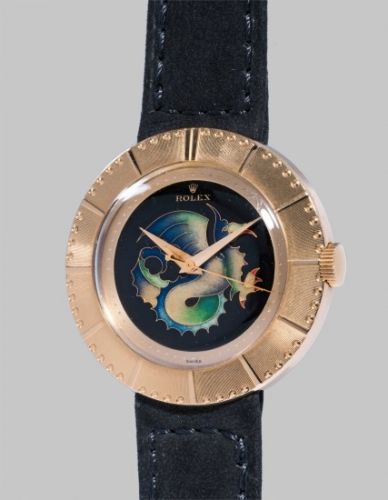 Rolex Follow;Ref. 8724;An extremely rare, important, and highly attractive yellow gold wristwatch with cloisonné enamel dial depicting a Chimera