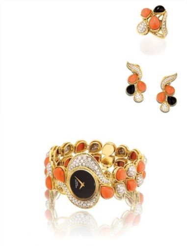 Patek Philippe Follow;Ref. 4321-1;A lady's rare and attractive gold, black onyx, coral and diamond-set bracelet watch with matching ring and earrings
