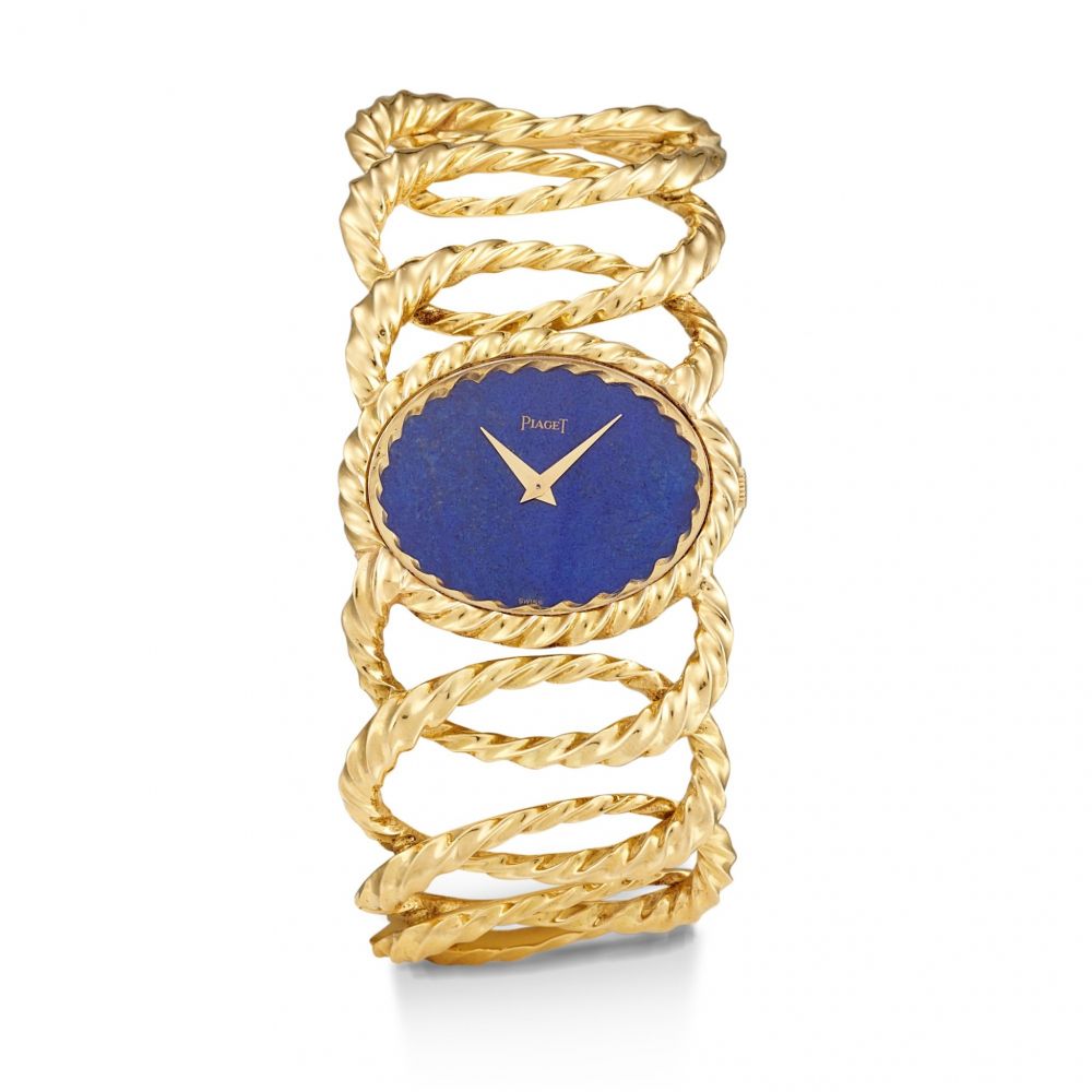 PIAGET | REFERENCE 9850 D65, A YELLOW GOLD BRACELET WATCH WITH LAPIS LAZULI DIAL, CIRCA 1970