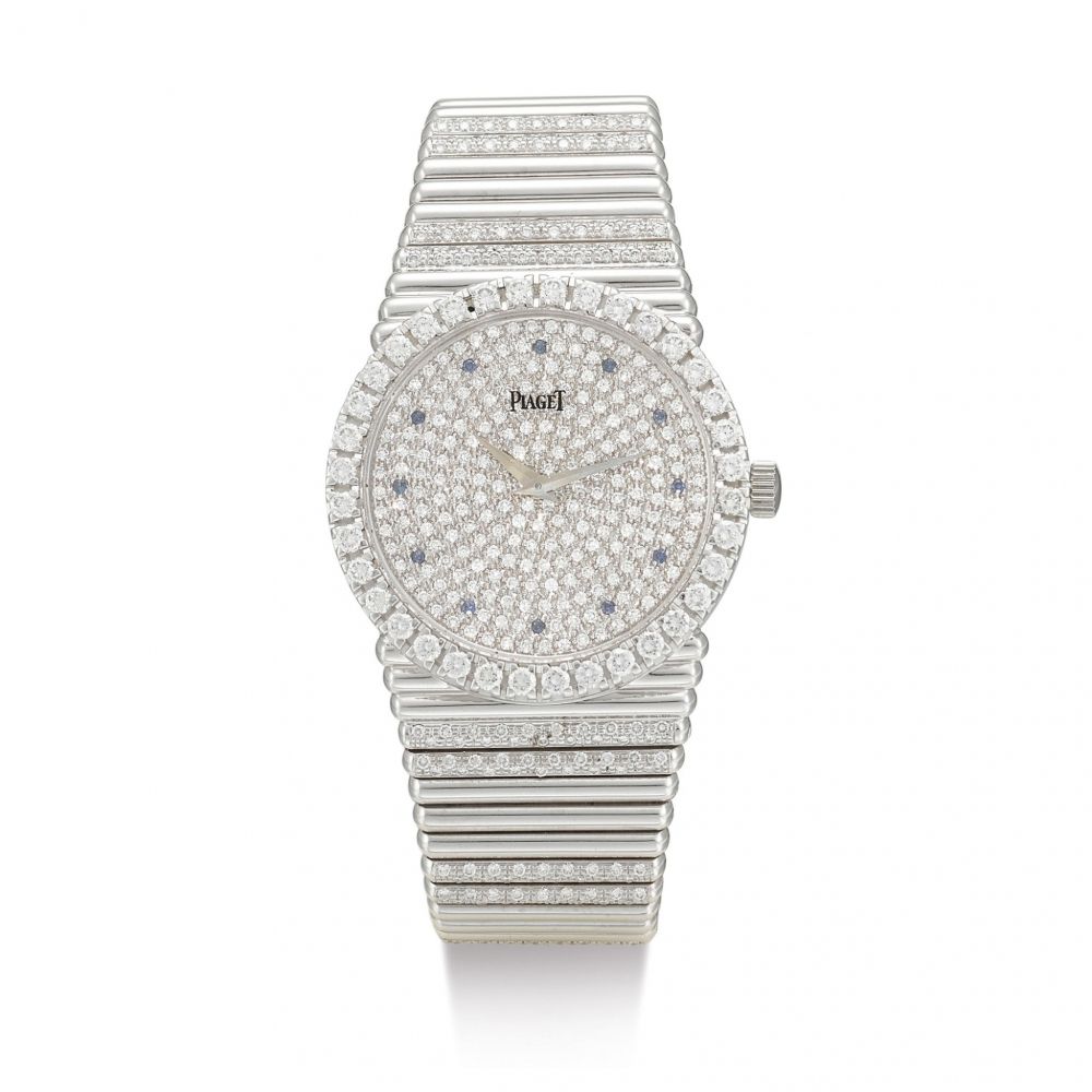 PIAGET | EMPERADOR, REFERENCE 12336C, A HEAVY WHITE GOLD, DIAMOND AND SAPPHIRE-SET BRACELET WATCH, CIRCA 1980