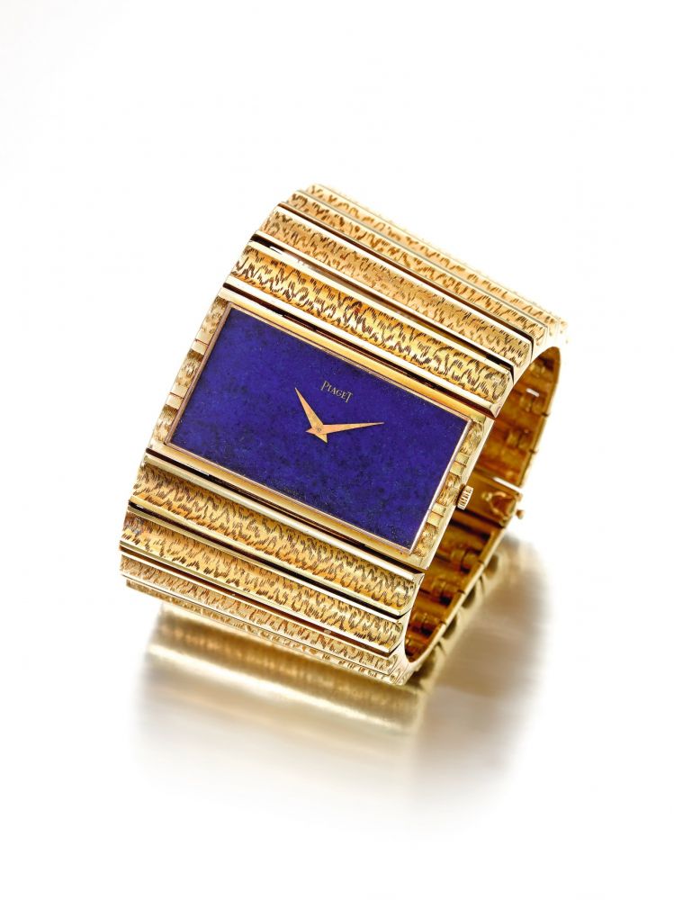 PIAGET | REF 9060 D 78, A YELLOW GOLD CUFF WATCH WITH LAPIS LAZULI DIAL CIRA 1970